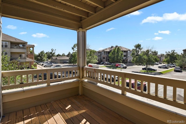 balcony with a residential view and covered porch