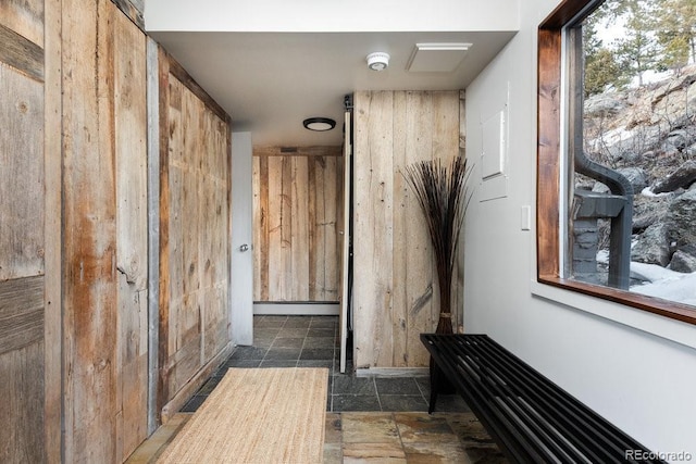 hallway with a baseboard heating unit