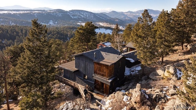 drone / aerial view featuring a mountain view