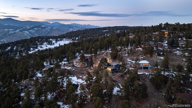 aerial view at dusk with a mountain view