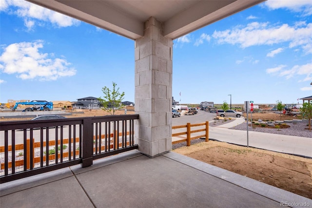 view of patio with a balcony