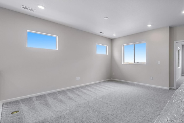 unfurnished room with carpet floors