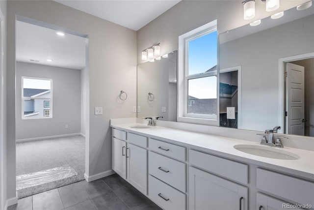 bathroom featuring tile patterned floors and vanity