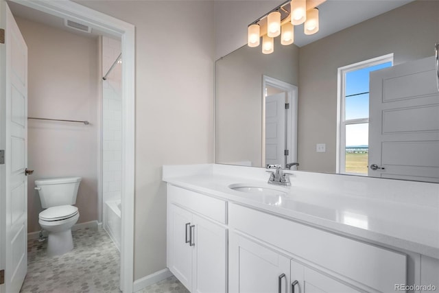 full bathroom with vanity, bathtub / shower combination, and toilet