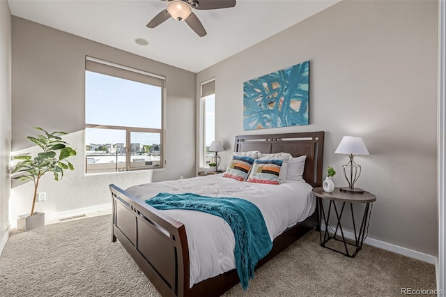 10305 Martin Luther King Blvd, Denver, CO 80238 - bedroom featuring carpet floors, baseboards, and a ceiling fan