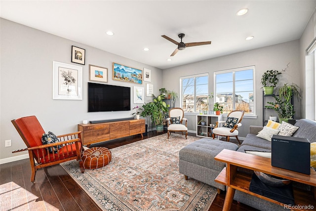 living area featuring recessed lighting, wood-type flooring, ceiling fan, and baseboards