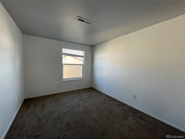 16485 E 17th Pl Unit D, Aurora, CO 80011 - empty room with carpet floors and baseboards