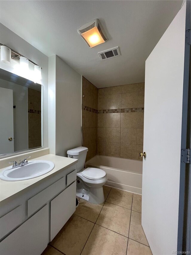 16485 E 17th Pl Unit D, Aurora, CO 80011 - bathroom with tile patterned floors, vanity, and shower / tub combination