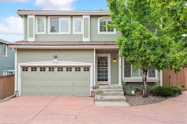 1449 Braewood Ave, Highlands Ranch, CO 80129 - view of front facade featuring concrete driveway, a garage, and a tile roof