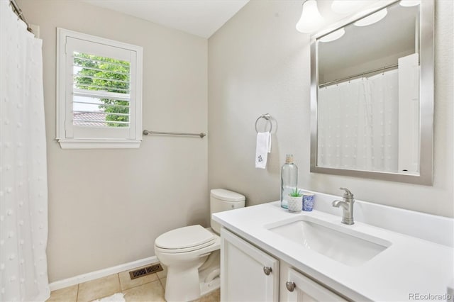 1449 Braewood Ave, Highlands Ranch, CO 80129 - bathroom with toilet, vanity, tile patterned flooring, and baseboards