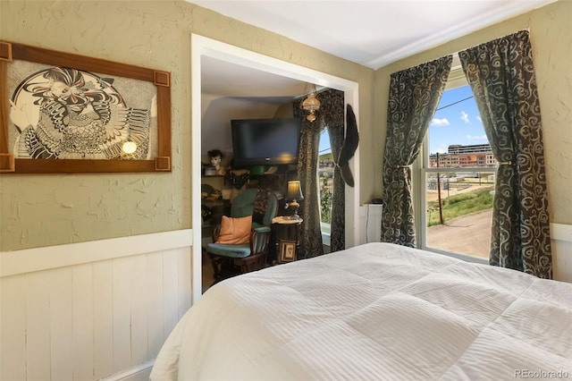 310 E Whiting Ave, Cripple Creek, CO 80813 - bedroom featuring a wainscoted wall