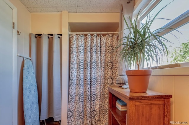 bathroom with a shower with curtain