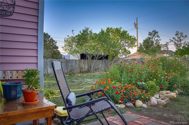 view of patio featuring fence