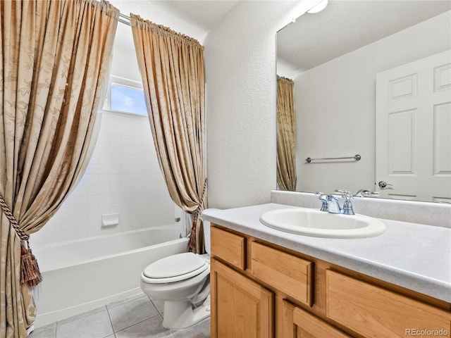 full bathroom featuring tile patterned floors, toilet, shower / bath combo with shower curtain, and vanity