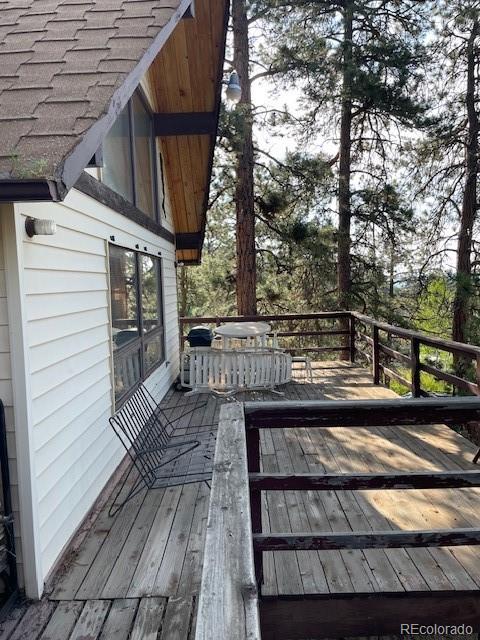 wooden terrace featuring grilling area