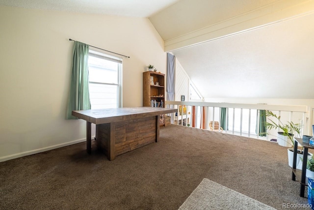 home office with dark carpet and lofted ceiling