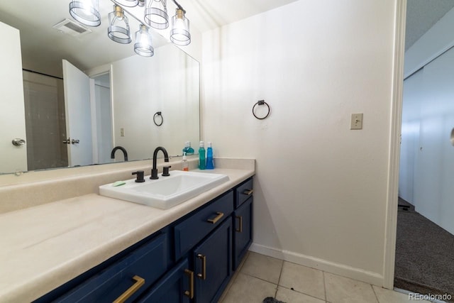 bathroom featuring vanity and tile patterned flooring