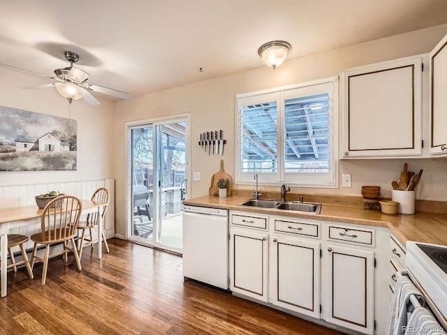 kitchen with electric range oven, sink, white cabinets, dishwasher, and ceiling fan