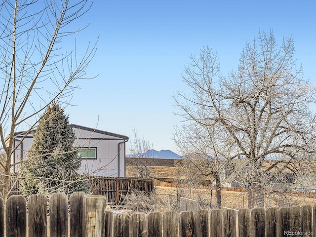 exterior space featuring a mountain view