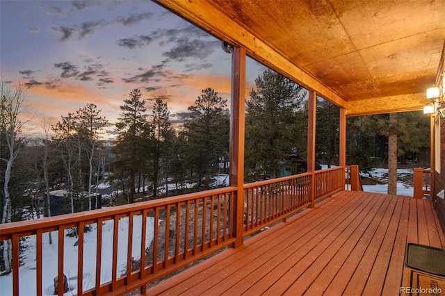 view of snow covered deck