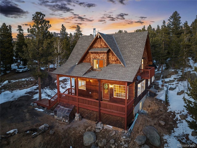 439 Ronnie Rd, Golden, CO 80403 - chalet / cabin featuring roof with shingles and a deck