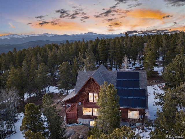 439 Ronnie Rd, Golden, CO 80403 - snowy aerial view featuring a mountain view and a view of trees
