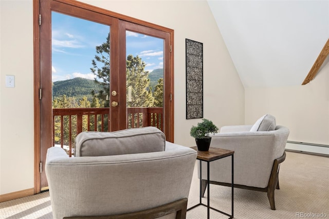 439 Ronnie Rd, Golden, CO 80403 - sitting room featuring light carpet, vaulted ceiling, and baseboards