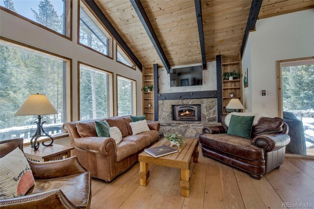 68 Starlit Ln, Blue River, CO 80424 - living room with beam ceiling, plenty of natural light, light wood-style floors, and wood ceiling