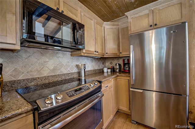 68 Starlit Ln, Blue River, CO 80424 - kitchen featuring tasteful backsplash, light brown cabinetry, wood ceiling, light stone counters, and stainless steel appliances