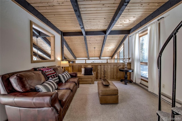 68 Starlit Ln, Blue River, CO 80424 - carpeted living area featuring wood ceiling, wood walls, lofted ceiling with beams, and plenty of natural light
