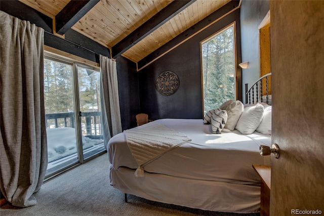 68 Starlit Ln, Blue River, CO 80424 - carpeted bedroom featuring access to outside, multiple windows, vaulted ceiling with beams, and wood ceiling