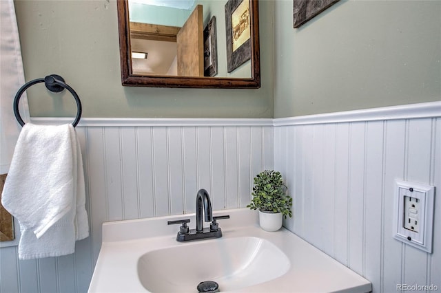 68 Starlit Ln, Blue River, CO 80424 - bathroom featuring wainscoting and a sink