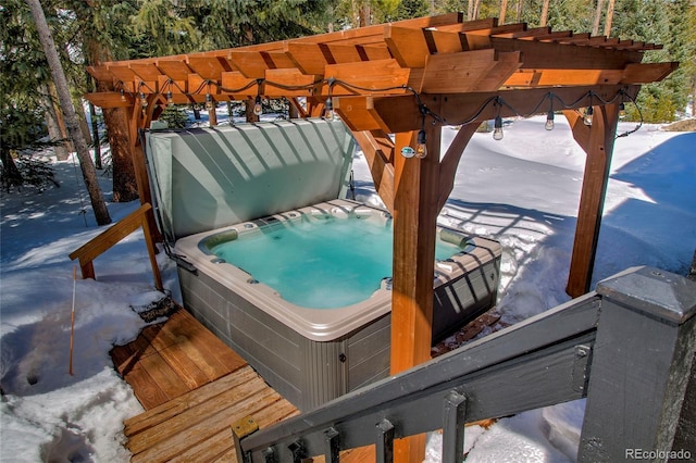 68 Starlit Ln, Blue River, CO 80424 - wooden deck featuring a pergola and a hot tub