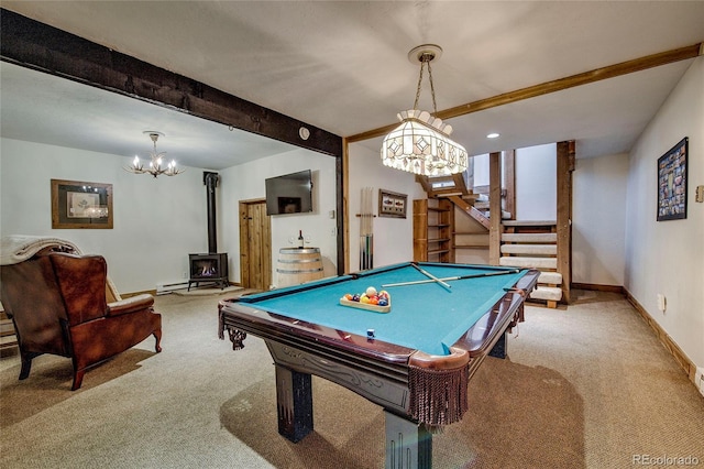 68 Starlit Ln, Blue River, CO 80424 - game room with a wood stove, an inviting chandelier, pool table, and carpet floors