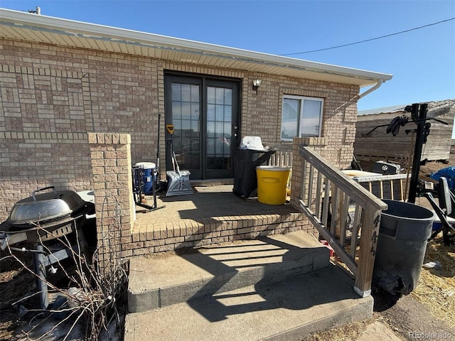 view of patio featuring french doors and grilling area