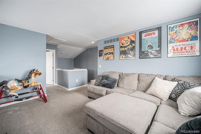 carpeted living area featuring lofted ceiling, visible vents, attic access, and baseboards