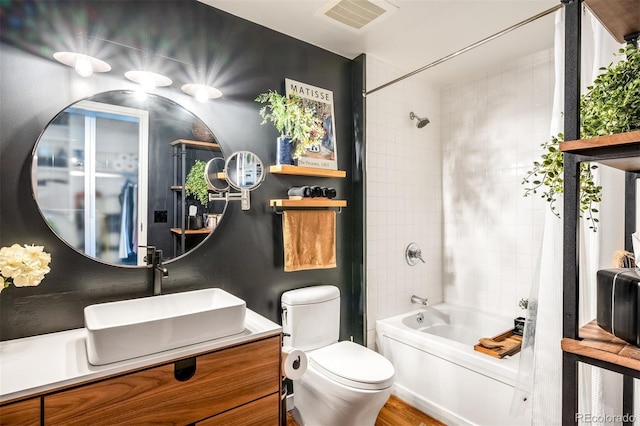 2955 Inca St Unit 2P, Denver, CO 80202 - full bath with vanity, shower / tub combination, and wood finished floors