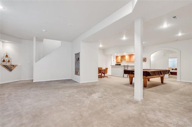 basement featuring billiards and light colored carpet