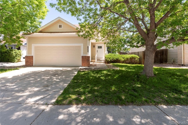 view of property hidden behind natural elements featuring brick siding, an attached garage, and concrete driveway