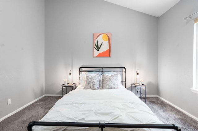 carpeted bedroom with baseboards