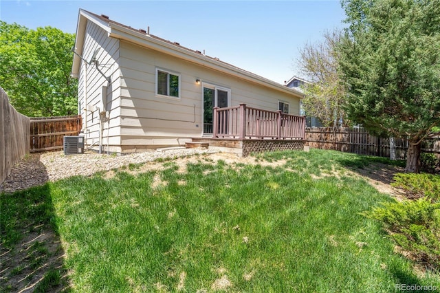 back of property featuring a wooden deck and central air condition unit