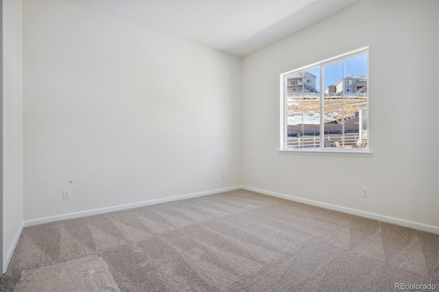 view of carpeted spare room