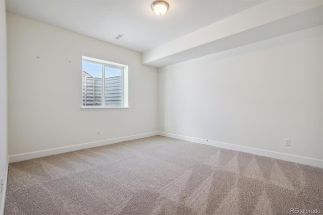 unfurnished room with carpet floors