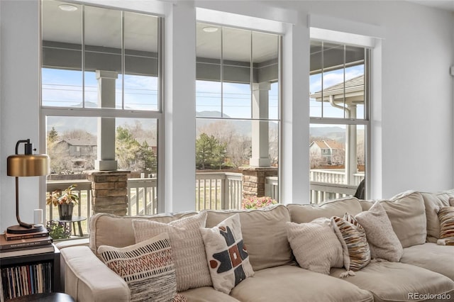 sunroom / solarium featuring plenty of natural light