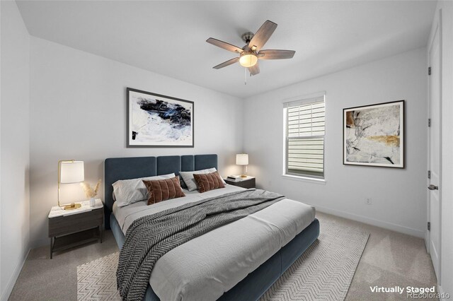 8109 Mount Ouray Rd, Littleton, CO 80125 - bedroom featuring baseboards, ceiling fan, and carpet