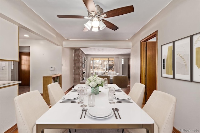 dining area with a ceiling fan