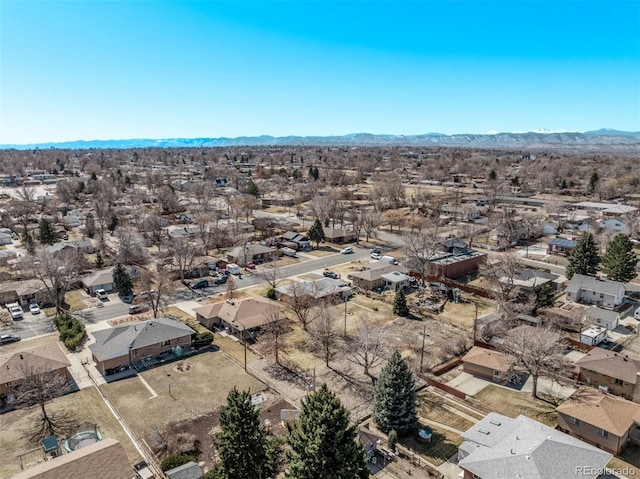 drone / aerial view with a residential view and a mountain view