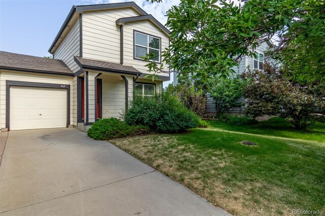 545 Tanager St, Brighton, CO 80601 - traditional-style house featuring a front lawn, driveway, and an attached garage