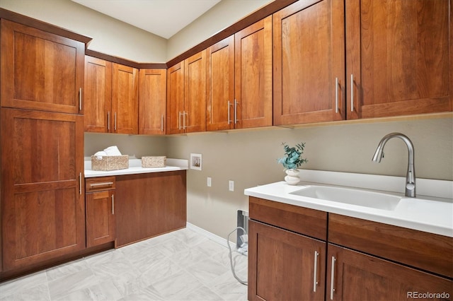 10731 Featherwalk Ln, Highlands Ranch, CO 80126 - laundry area with cabinet space, washer hookup, and baseboards