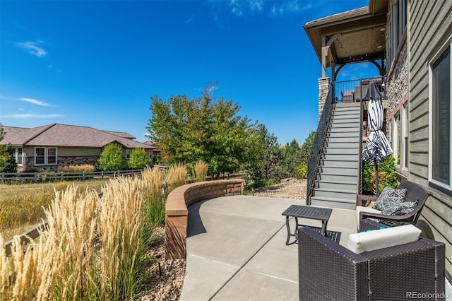 10731 Featherwalk Ln, Highlands Ranch, CO 80126 - view of patio featuring stairway